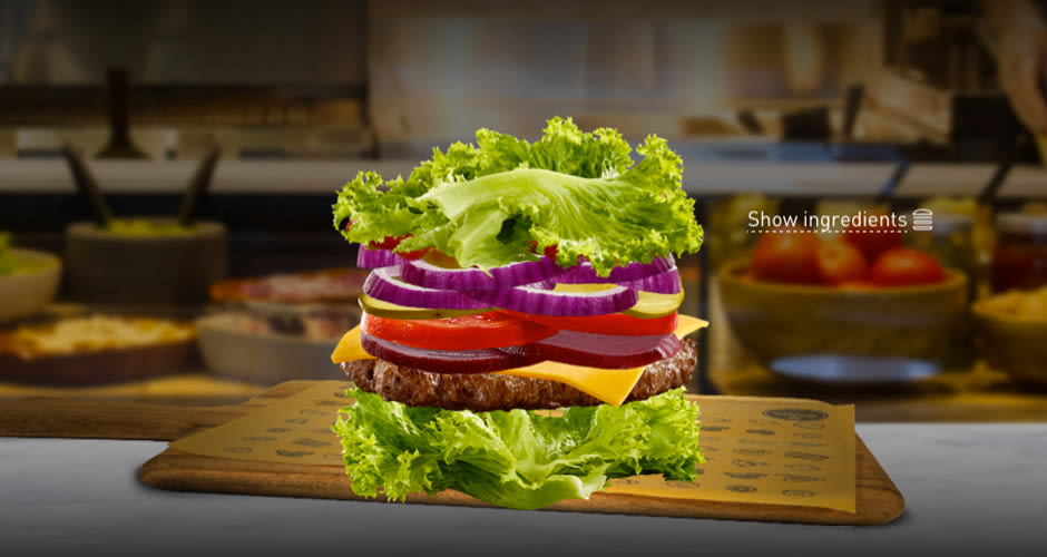The Newest Item at McDonald's A Hamburger Patty Between Some Lettuce