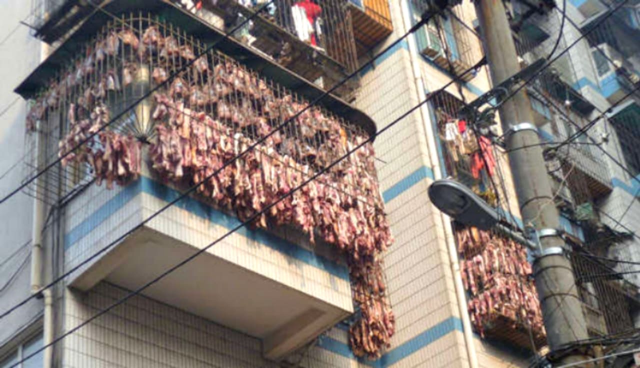 Chinese Apartment Owner Covers All Of His Windows With Dangling Bacon Strips First We Feast