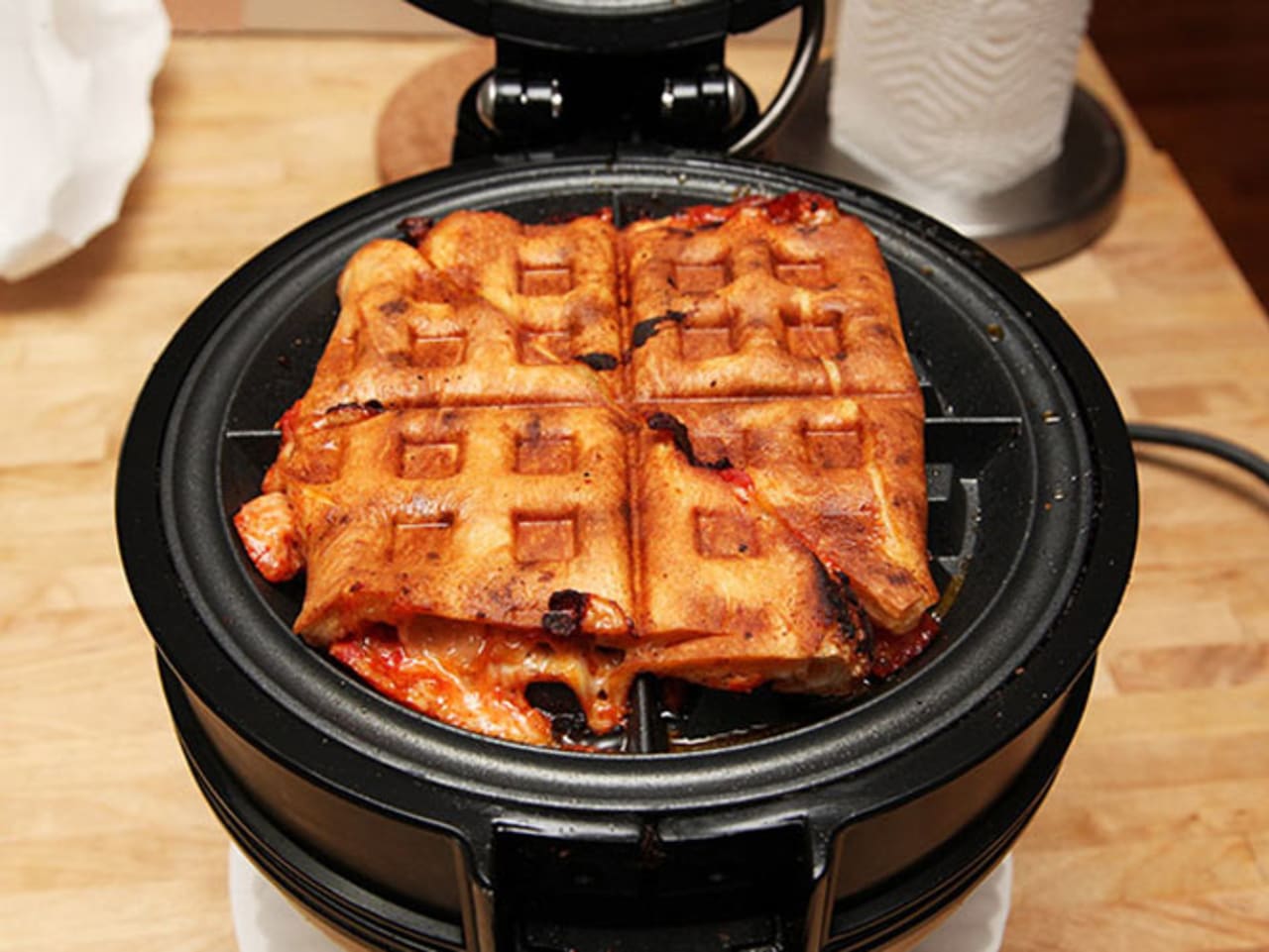 Leftover Pizza Waffle Iron Delicious Crispy Gooey Cheese Stuffed Snack First We Feast Leftover pizza, if done right, tastes even better the next day. leftover pizza waffle iron