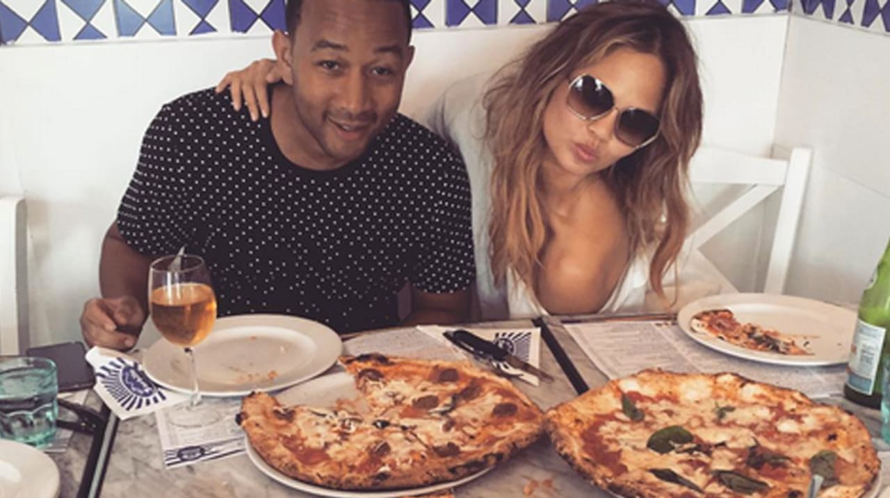 Chrissy Teigen And John Legend Are The Queen And King Of Pizza First We Feast