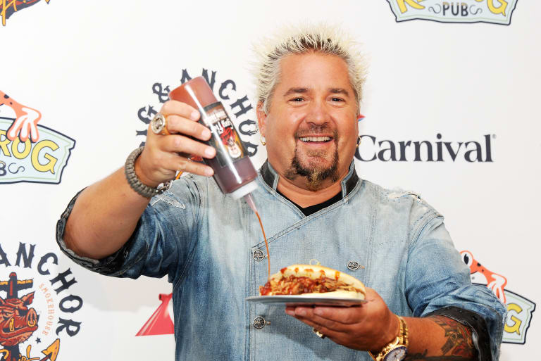 Guy Fieri Finally Explains Why He S Kept His Amazing Hair Cut All These Years First We Feast